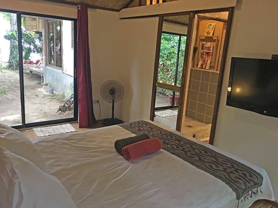 Bedroom #1 with direct access to the garden