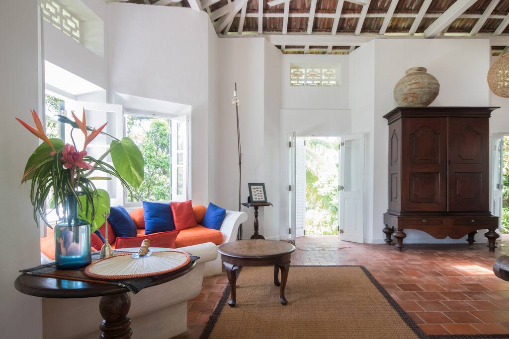 Relaxed window seat with open French doors to allow the outside inside #windowseat #frenchdoors