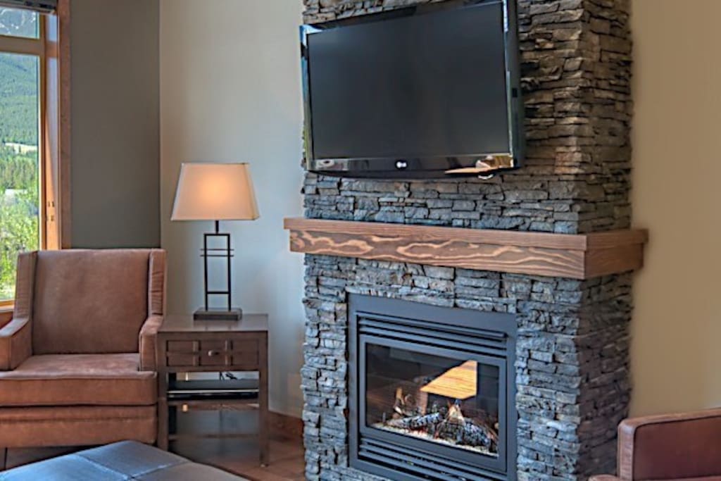 Chic stone fireplace in the lounge area