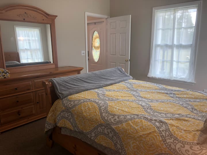 Bedroom one with queen bed
