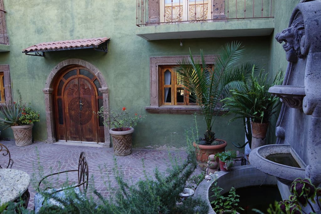 Front patio green area and fountain to spend time drinking your morning cup a tea or coffee.