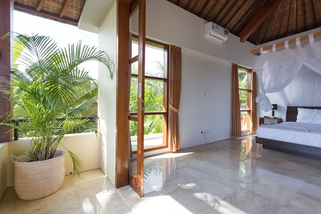 large, sliding glass doors open fully