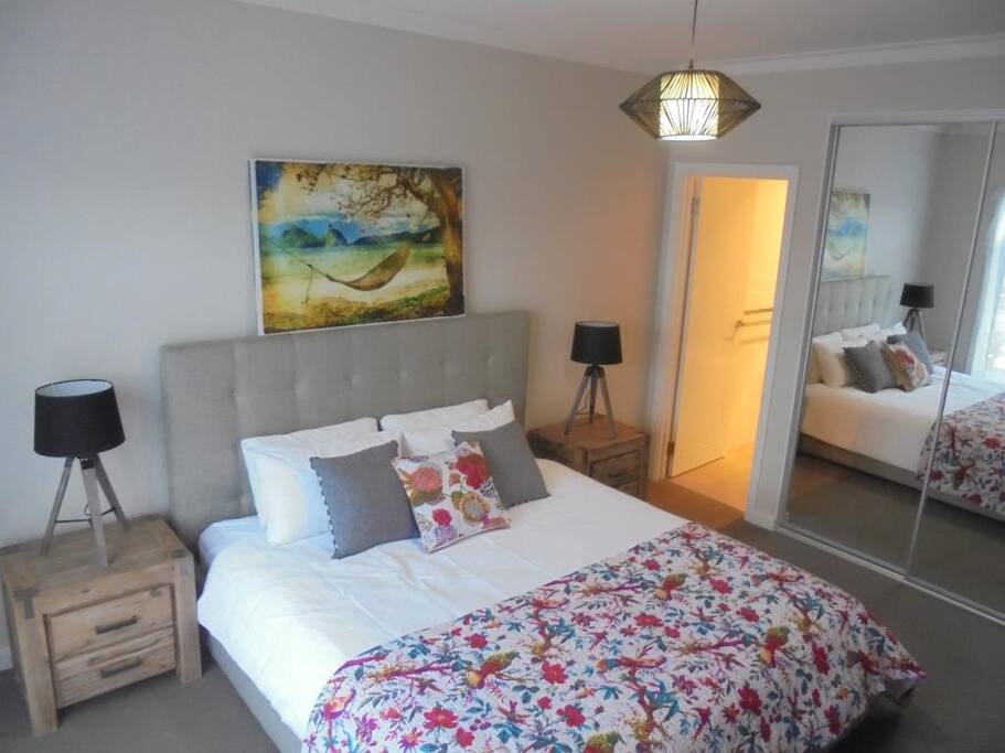 Master bedroom with king size bed, ensuite and built in robe