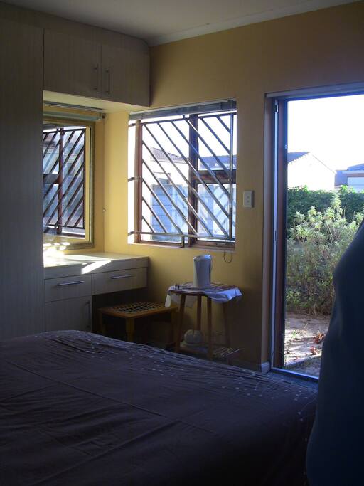 Big mirror with extra lamp for when getting ready for the day.