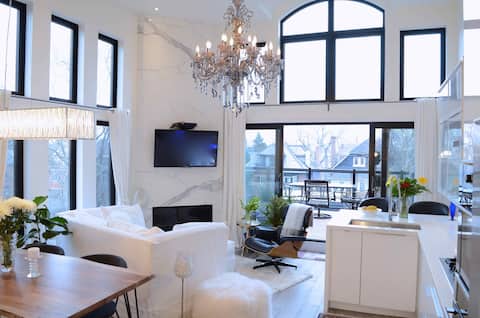 Popular Airbnb listing: Designer Annex Loft with Sunset Deck / EV Parking in University—Rosedale
