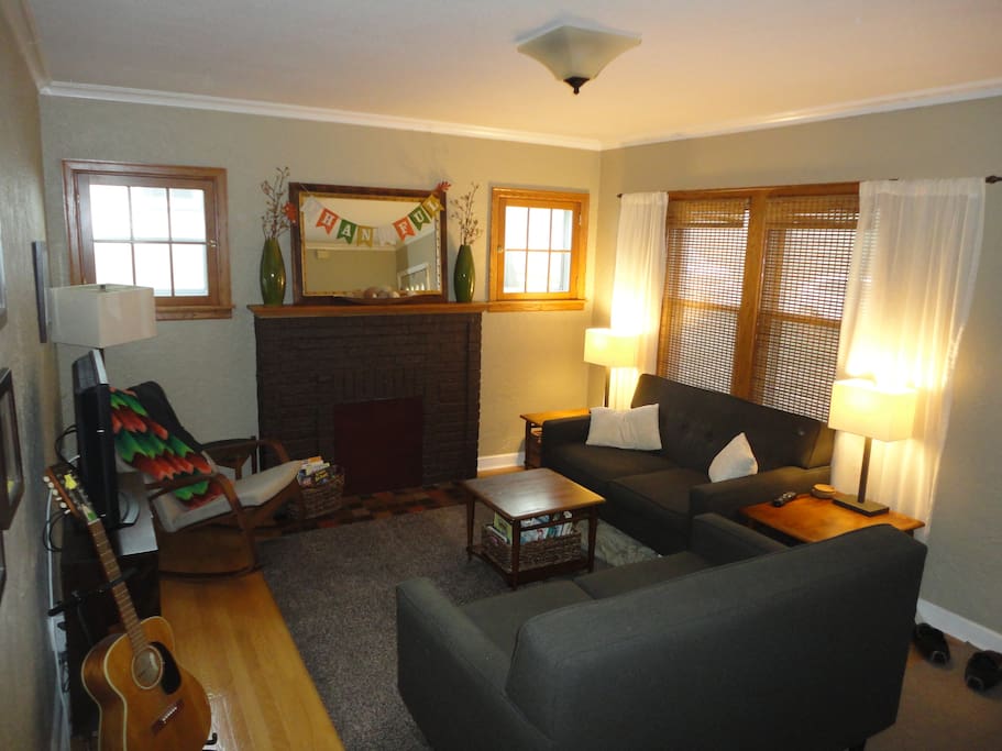 Comfortable living room features a flat screen tv