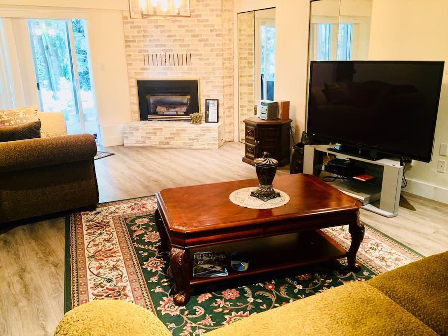 Relaxing living room with view. TV, wi-fi and comfortable seating.