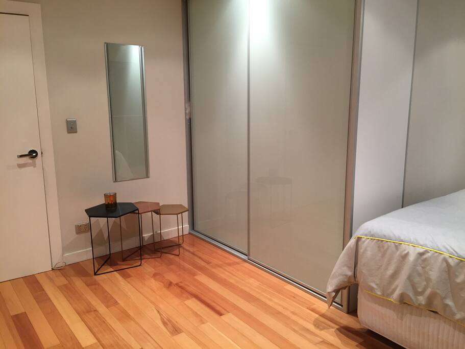 Spacious bedroom w a built in wardrobe