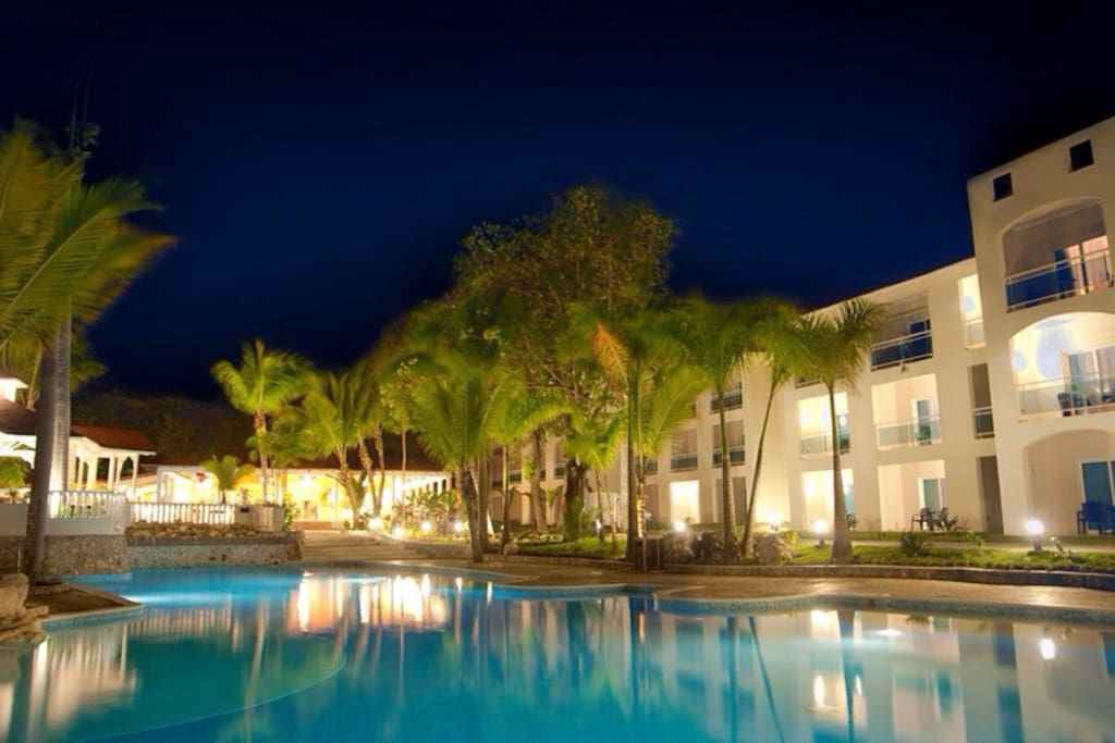 Exterior of the building, the beach is just across the pool!