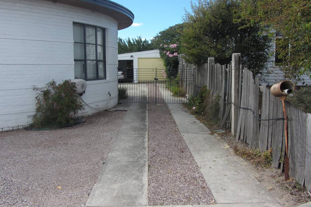 At the end of the driveway, tucked at the back of the car-port you'll find............