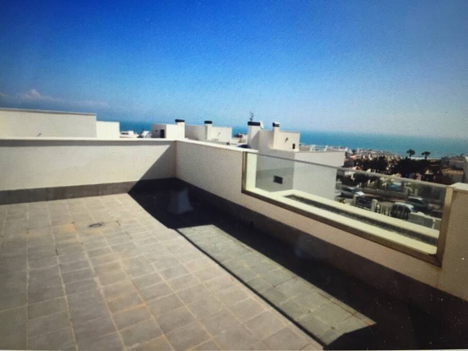 Rooftop terrace with sea views