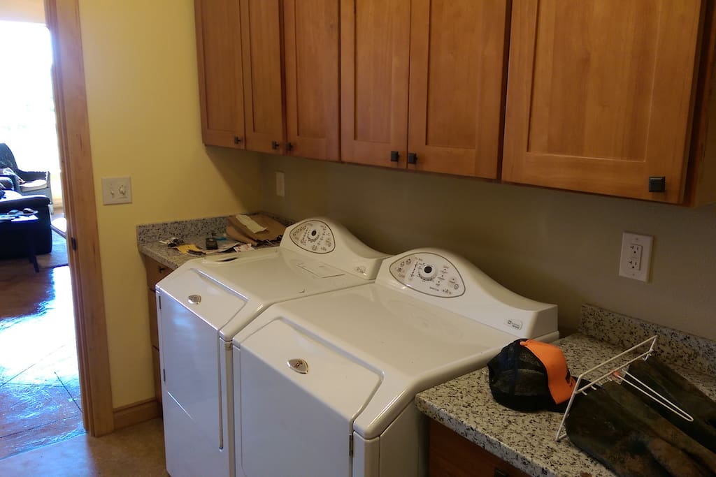 Laundry area right off the kitchen with access to 2 car garage.