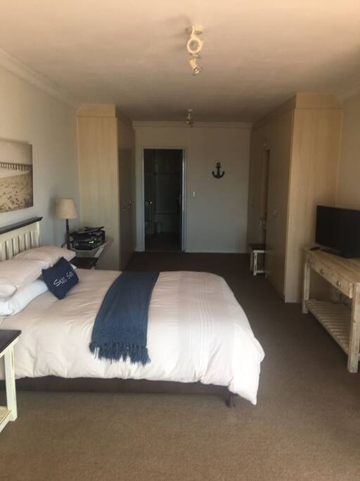 MAIN BEDROOM WITH TV