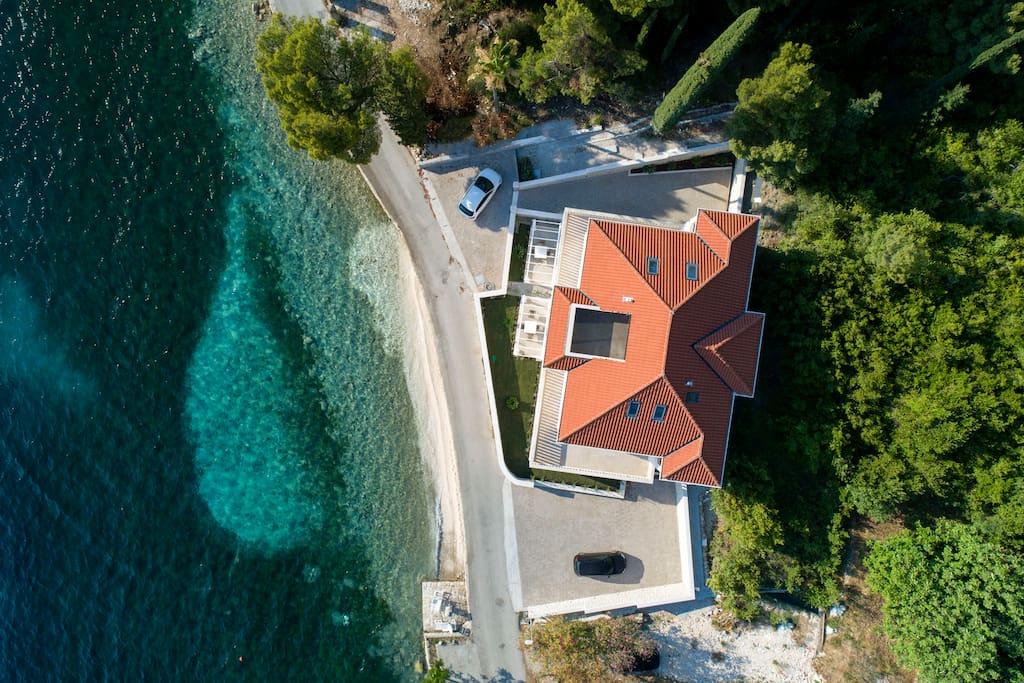 Crystal sea in front of the house