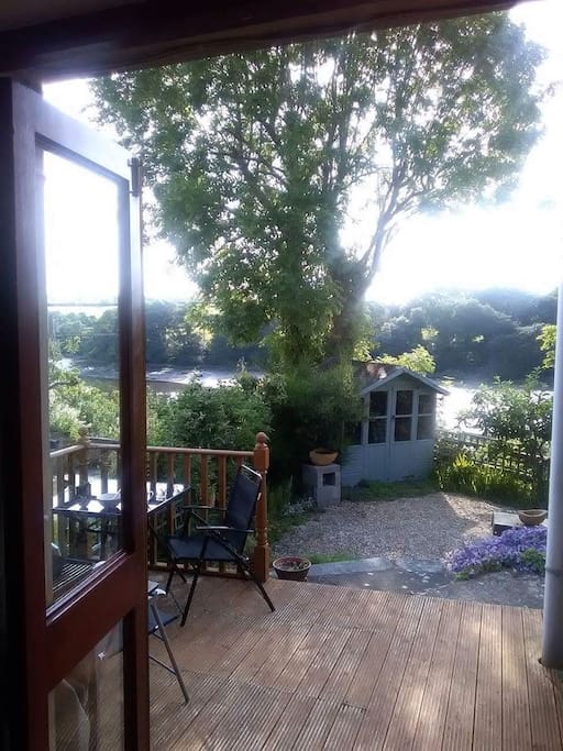 Deck and garden from the living room. Alfresco eating with great views! Plenty of garden furniture in the summerhouse