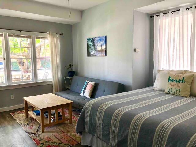 Sunlit Surf House- 4BR | Downtown | Walk to beach gallery image 5