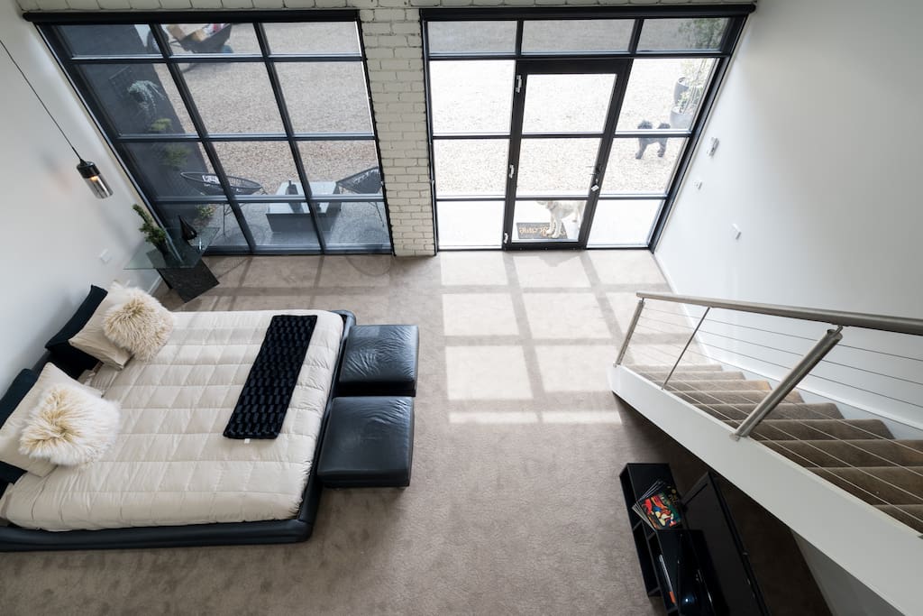 Mezzanine level looking downstairs to the spacious accommodation