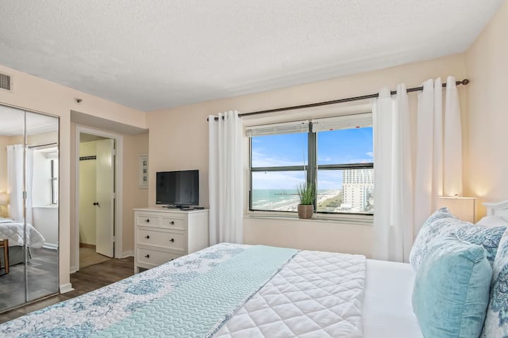 South facing window in the bedroom with beautiful ocean and beach view.
