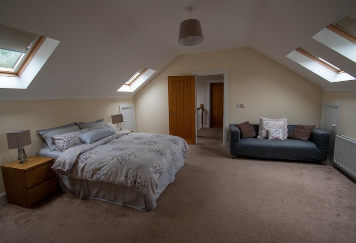 5th master bedroom on 1st floor with dressing room and en suite bathroom with bath and separate shower