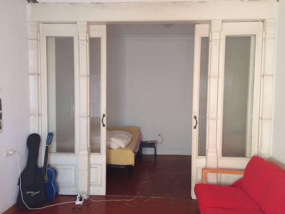 Room. As you can see it has a sliding door that allows the light but reduces the sounds.