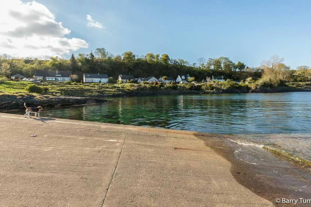Achnacroish ferry slip - our cosy cottage is situated to the far right! Picture by Barry Turner ©