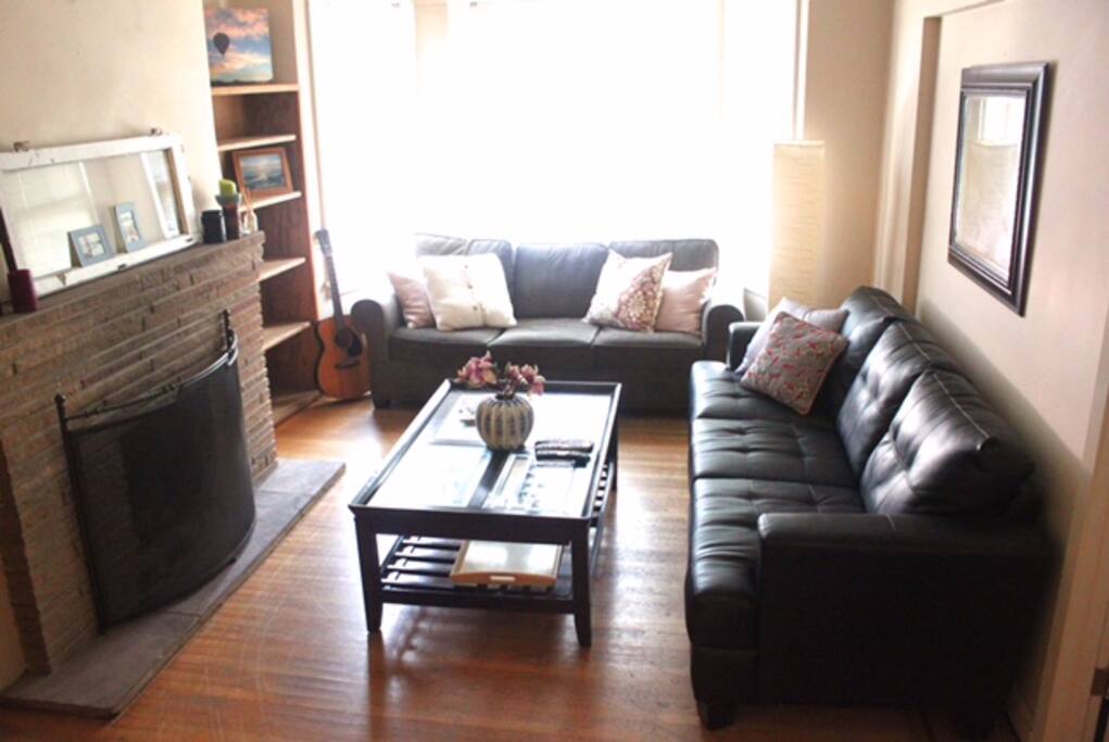 The living room with couches and TV.