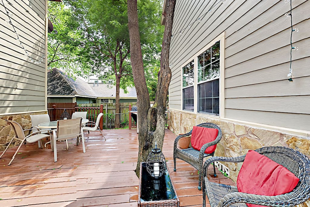 An alley patio makes for a pleasant shady respite.
