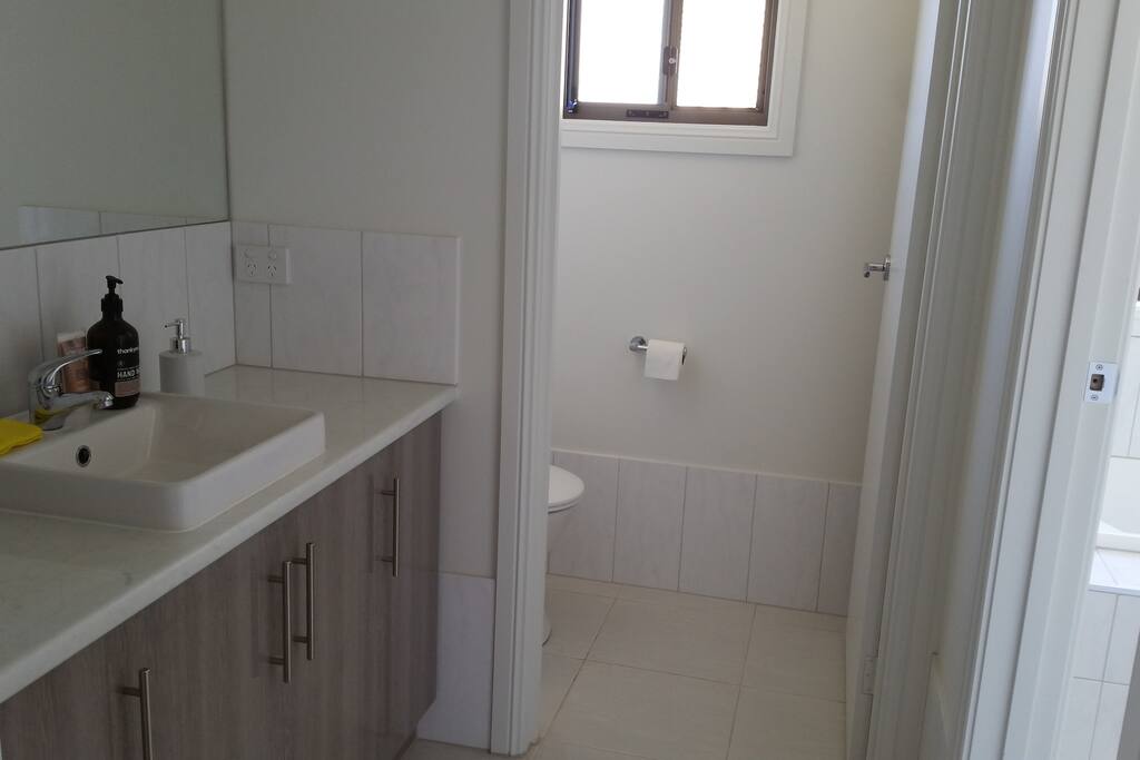Separate toilet, powder room, and bath and shower.