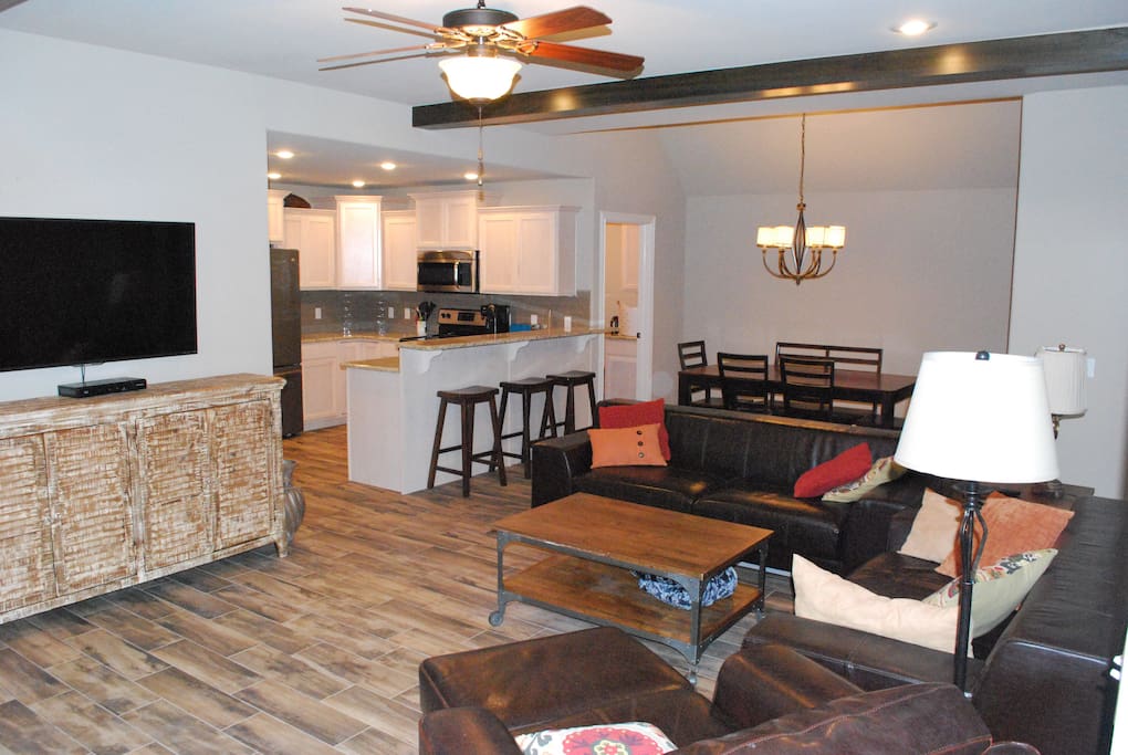 family room features 55" smart TV
