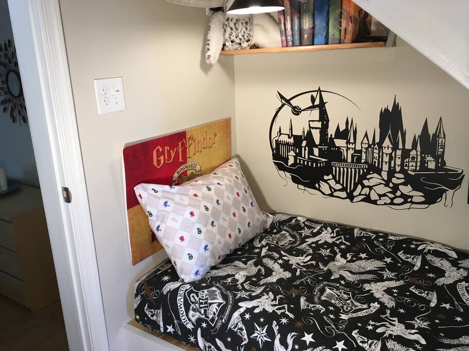 Harry Potter cupboard-under-the-stairs with pull-down privacy shade.
