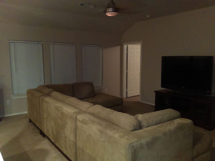 Back view of Living quarters sofa and flat screen television to watch the game on