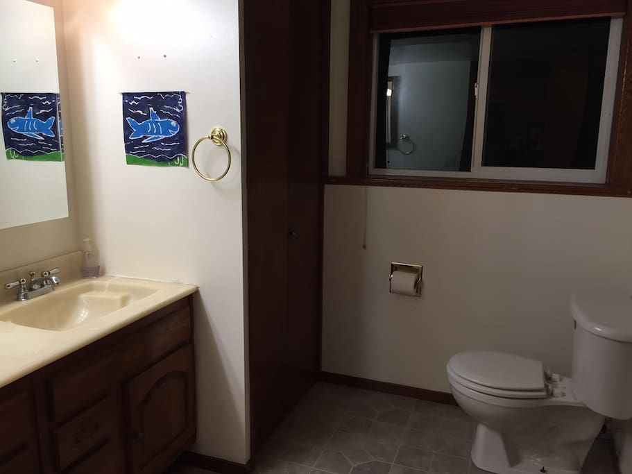 Private bath directly across the hall from the bedroom.