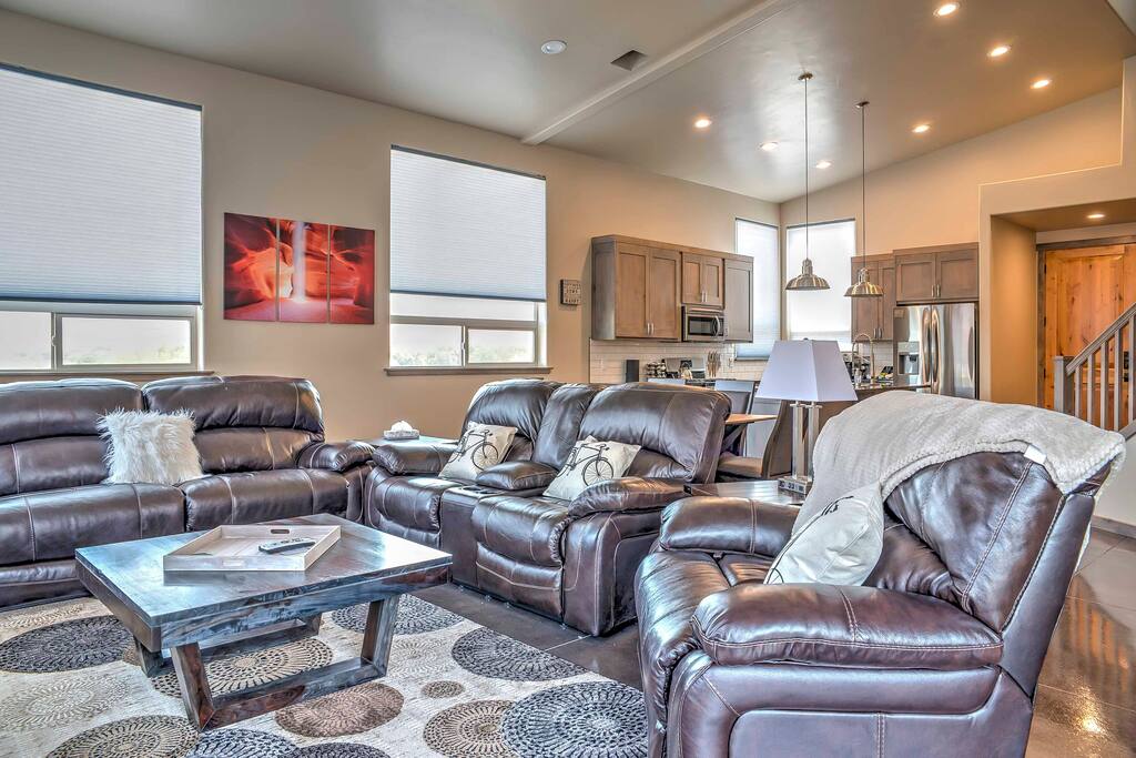 Kick back on the plush leather couches in the living room!