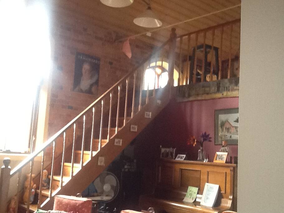 Two staircases give access to living and seperate bedrooms