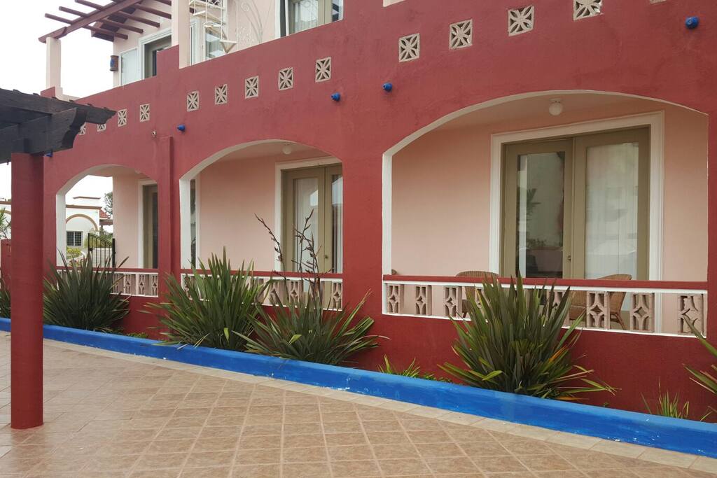 back patio. 3 French doors from living room, 2nd bedroom, and master bedroom boasting beautiful ocean views.