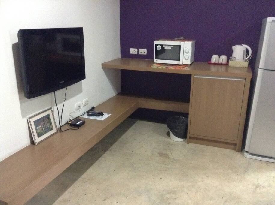 TV, microwave, kettle, and a big fridge! Guests get two bottles of water--daily