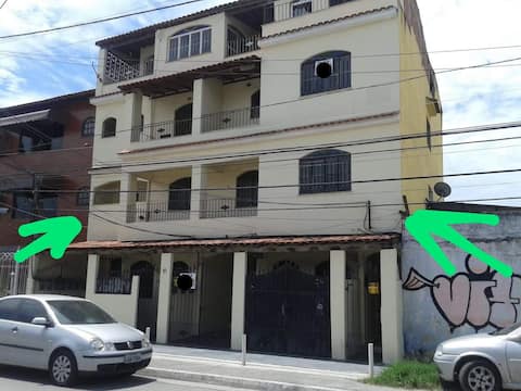 2 bedroom apartment with garage and balcony, facing a ventilated area.