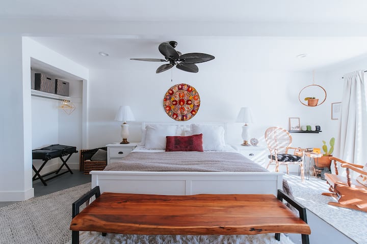 Master Bedroom with slider doors to terrace with great views. Washer and dryer in room. Loads of natural lights. Room darkening curtains for a restful sleep. Bed is Cal King Size so sleeps 2-4 People.