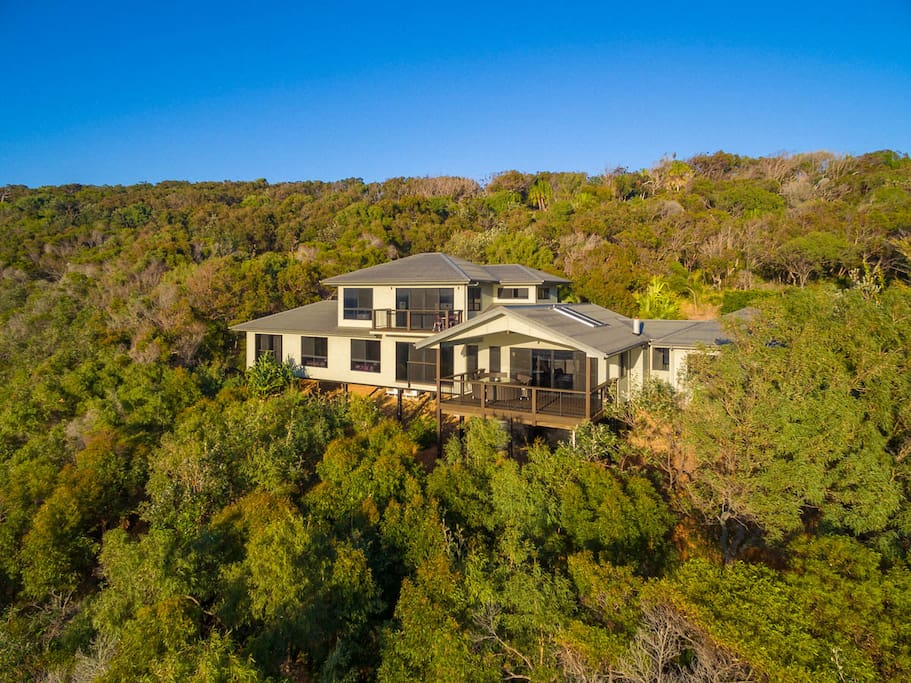Nestled into a hillside within the confines of an exclusive gated enclave of just six homes, on 14 picturesque acres