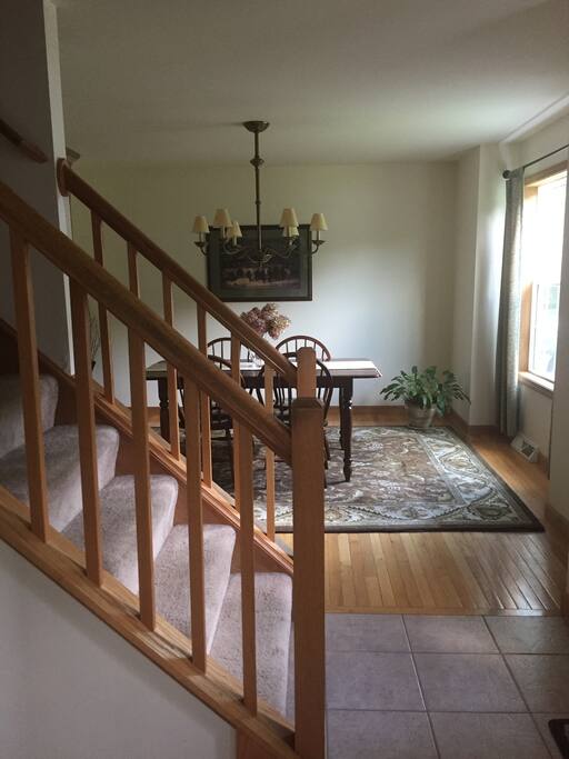 Main staircase and dining room view from office doorway.