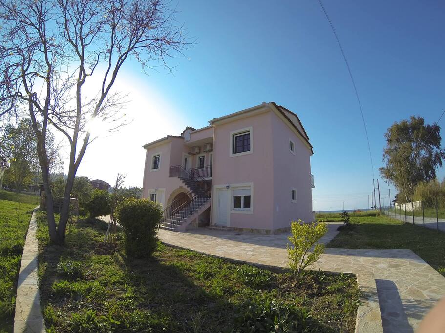 Well kept rental Corfu. Back yard of property of six apartments. Three on second floor and three on first floor. Balconies with beach view in front as you can see.