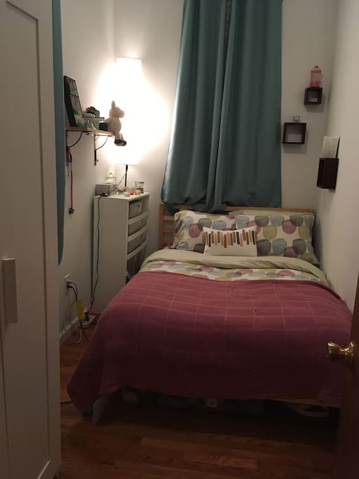 Bedroom with double bed and wardrobe, can fit 1-2 guests
