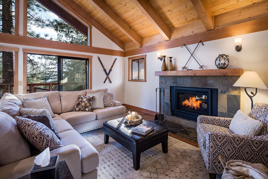 The elegant yet completely cozy great room is the perfect place to relax next to the gas fireplace or curl up and watch a movie on the large flat screen TV. The dining room and kitchen are adjacent to the living room making it ideal for entertaining.