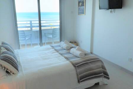 Beachfront modern studio with ocean view balcony