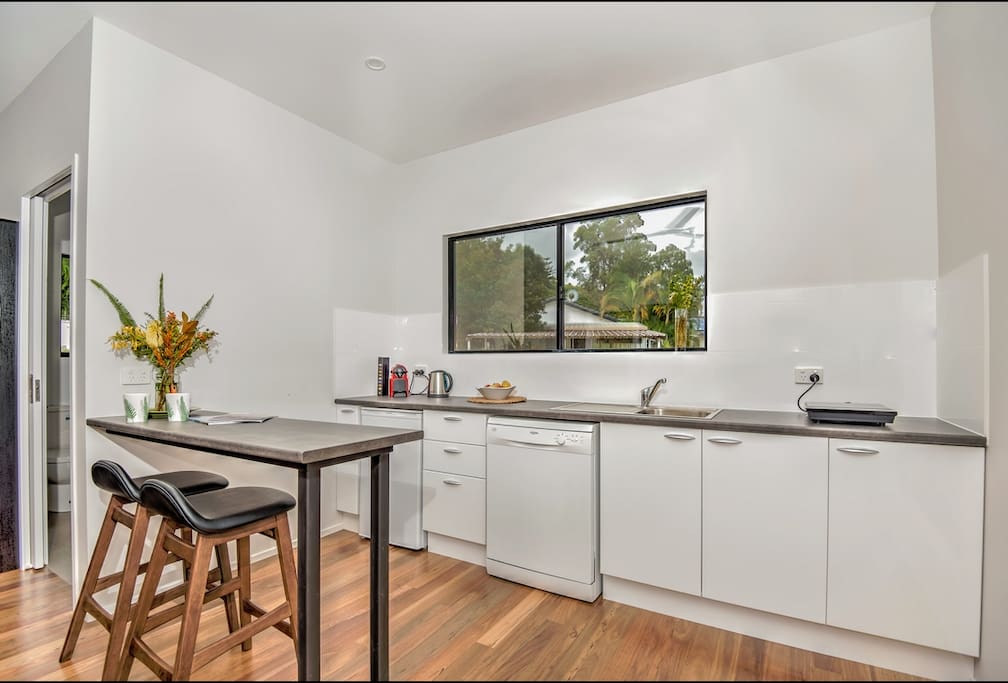 Complete kitchen with cook top, fridge, toaster, kettle & espresso coffee machine