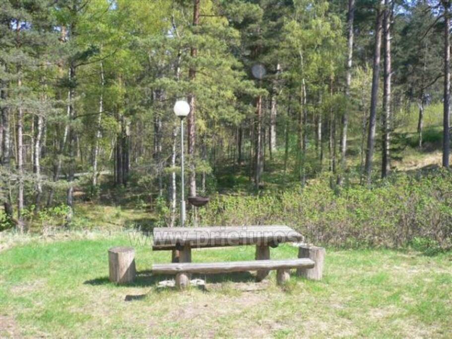 Outside there is a terrace with timbered furniture for a rest. There you can roast a barbecue (grill)