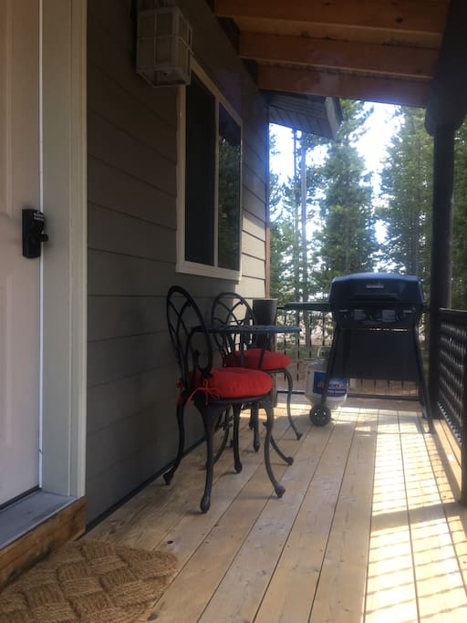 Deck with BBQ and a bistro set