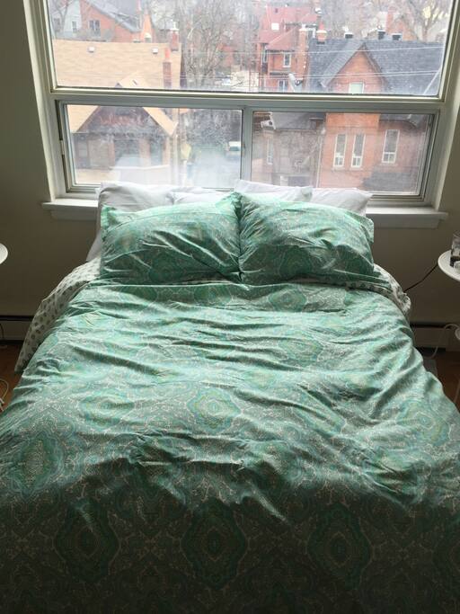 The comfiest bed in the world! Other bedroom features include: 2 end tables, large window, full-length mirror, television, dresser, and closet