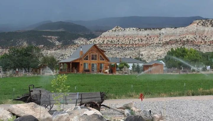 Cedar Cabin from a distance with boulder mountain.