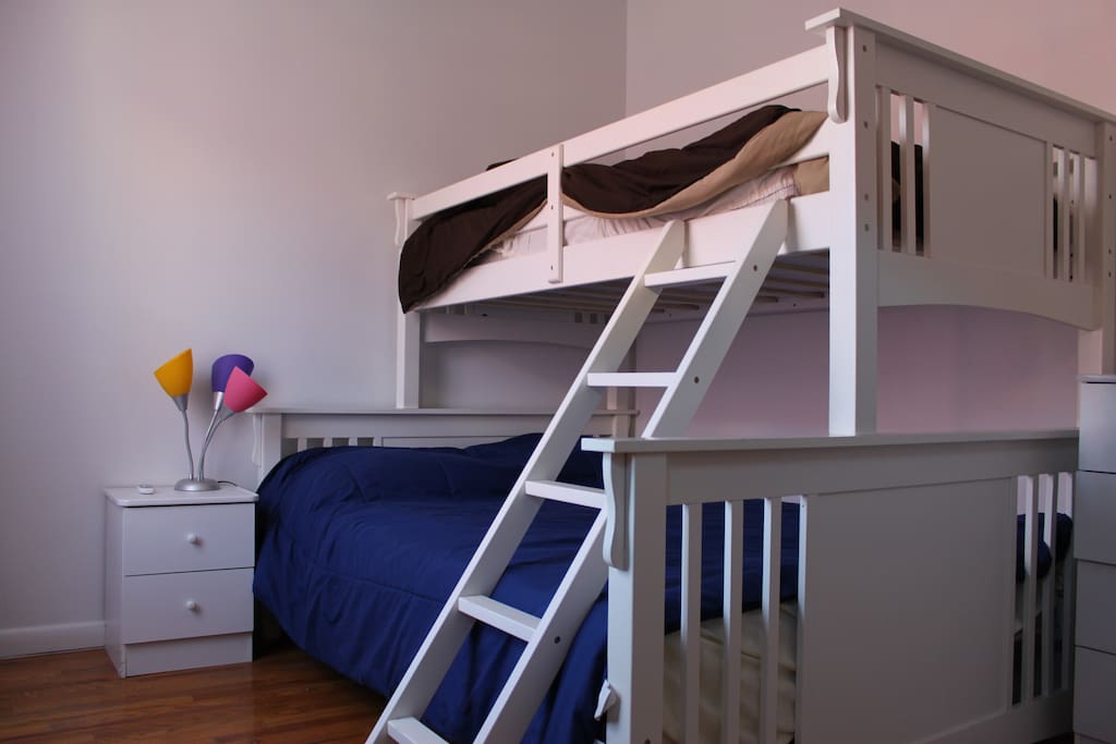 Queen sized bed with Bunk above